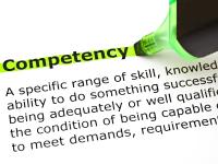 En overstregnings-pen har markeret ordet "Competency" med grønt.